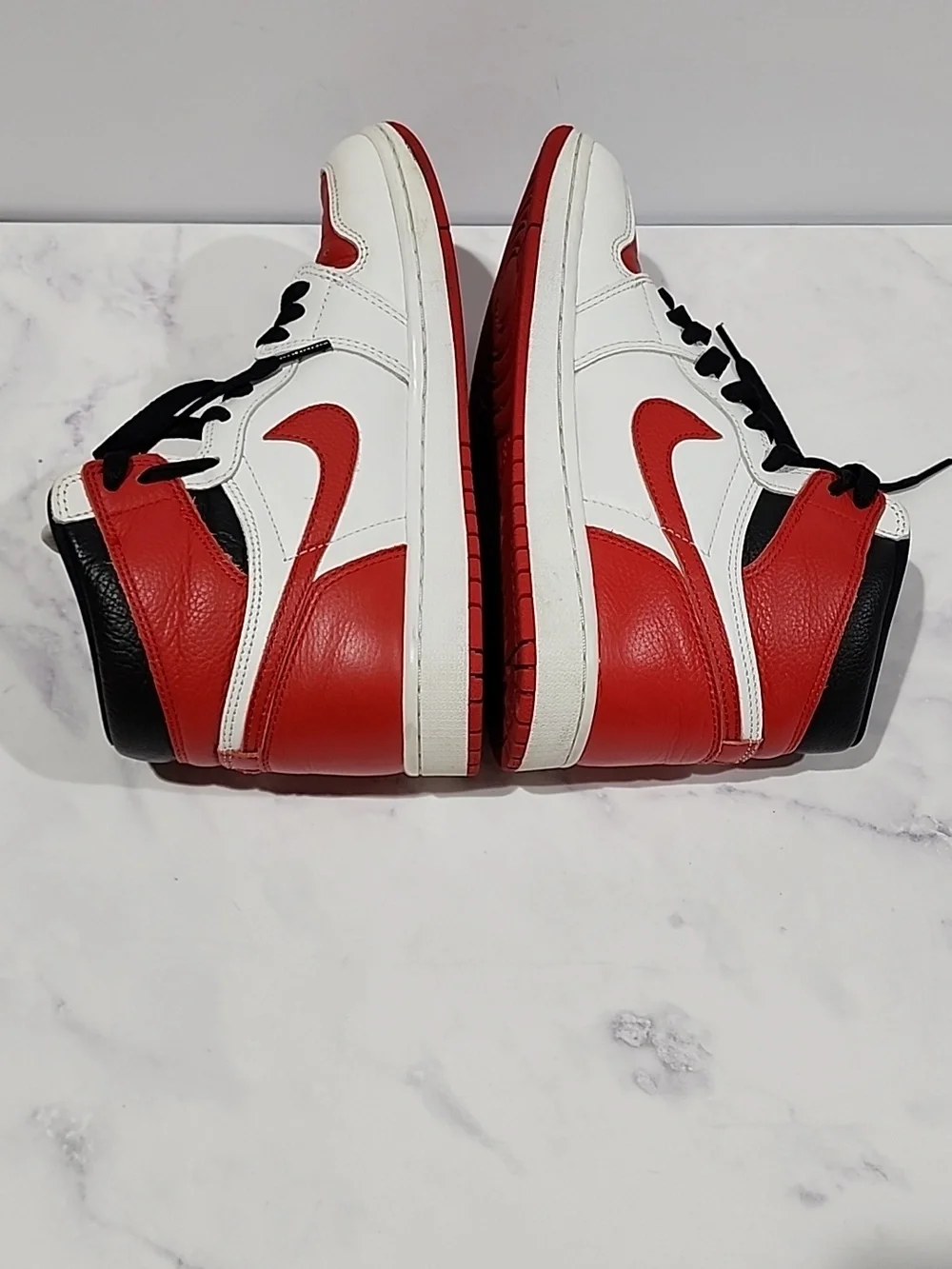 Nike  Air Jordan 1 Red and White High-Top Sneakers